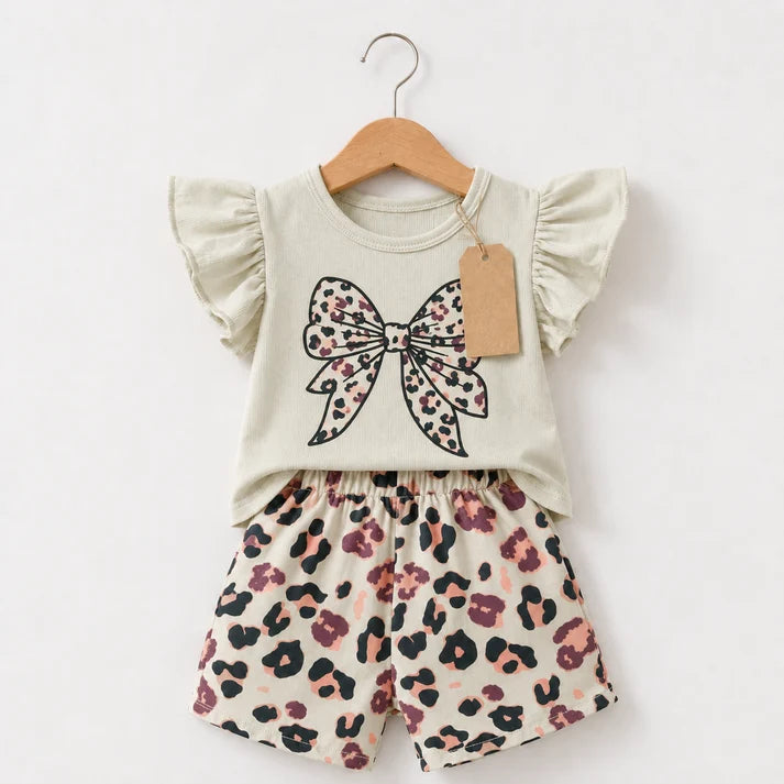 Original photo of cream bow-print top and matching patterned shorts