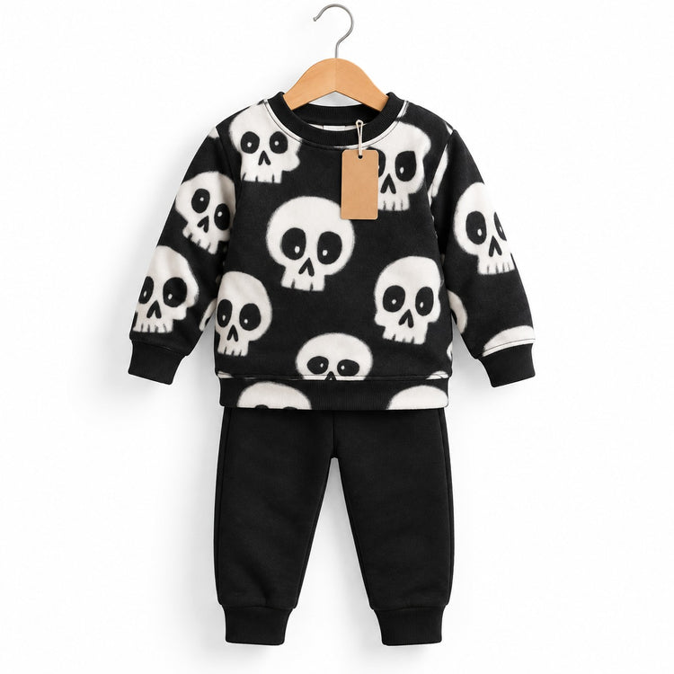 Black crewneck sweatshirt with white skull print and matching black cuffed jogger trousers