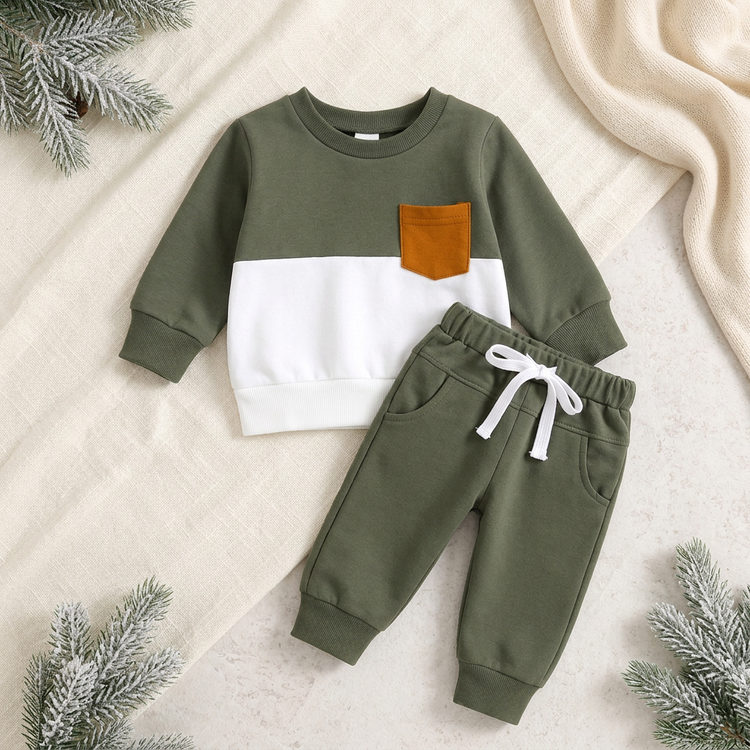 Kids’ olive-and-white sweatshirt with mustard-brown chest pocket and matching olive joggers in a winter catalog setting